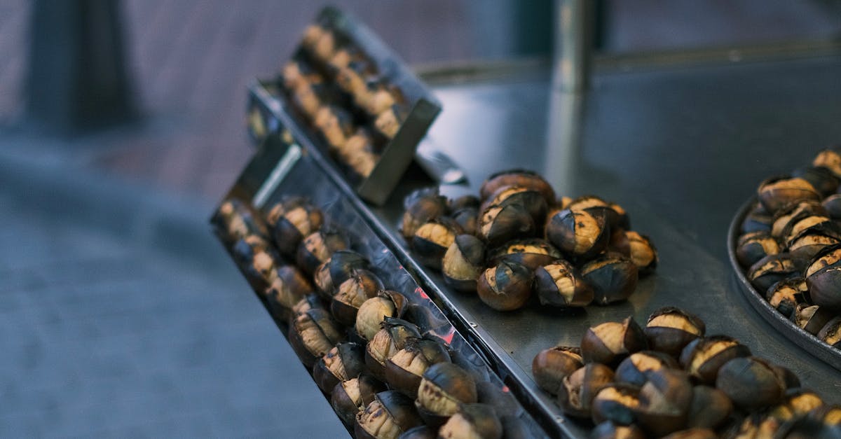 A street vendor selling nuts on a cart