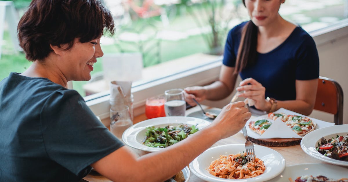 Asian women having lunch in restaurant