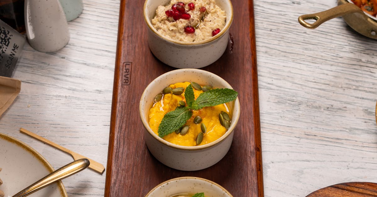 A wooden tray with four different types of food