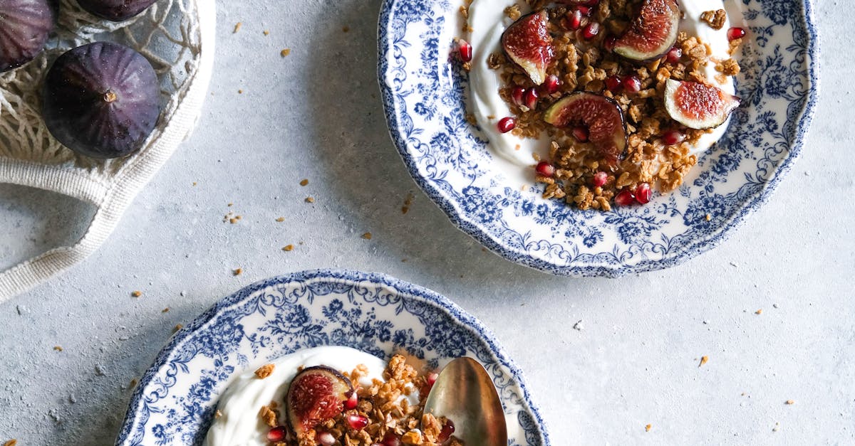 Top View of Dishes with Yogurt, Granola and Figs