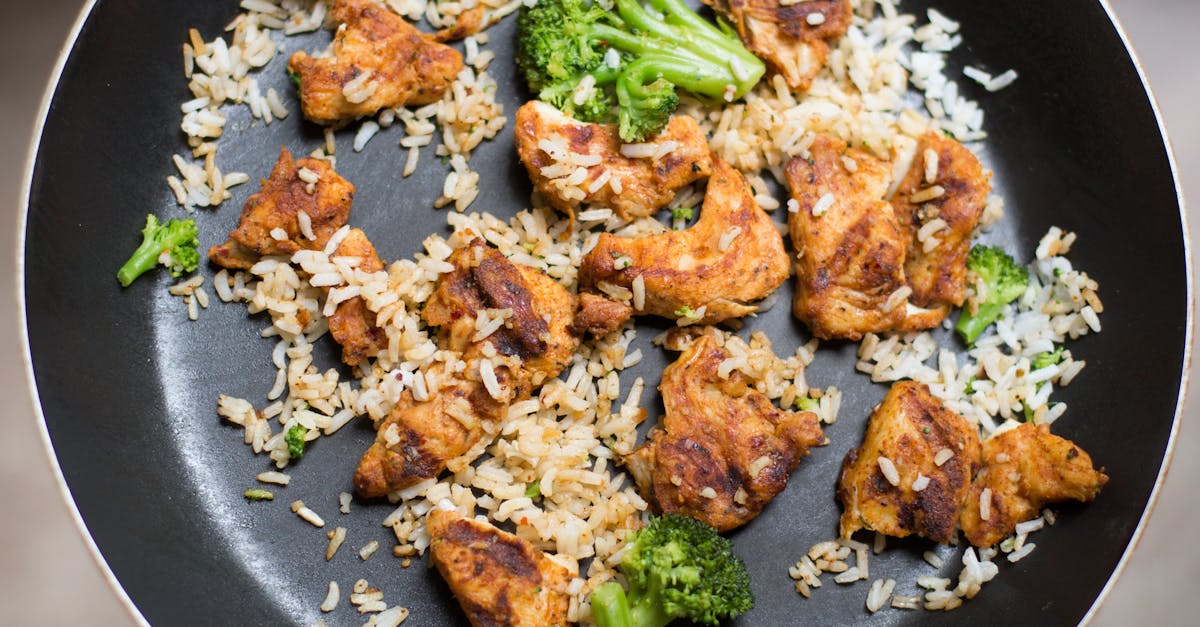 White Rice, Chicken and Broccoli on Black Non-stick Pan