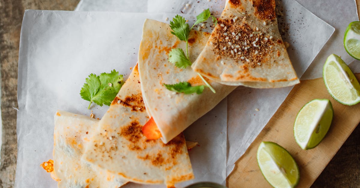 Quesadillas on a Brown Wooden Board with Sliced Limes