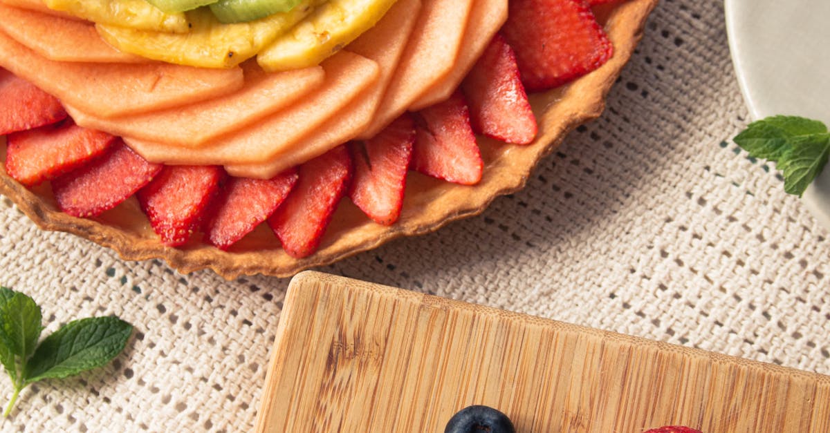 Fresh Fruits and Fruit Tart On Table