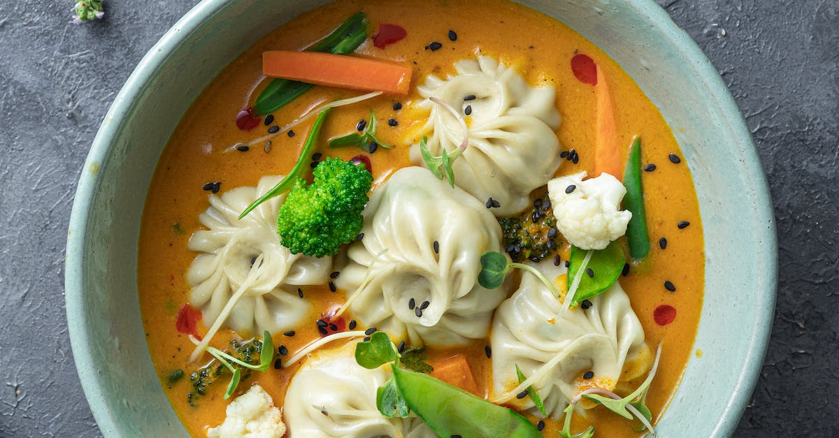 Soup with Dimsums and Vegetables on  Ceramic Bowl