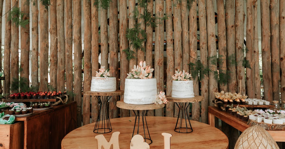 White Ceramic Plates on Brown Wooden Table