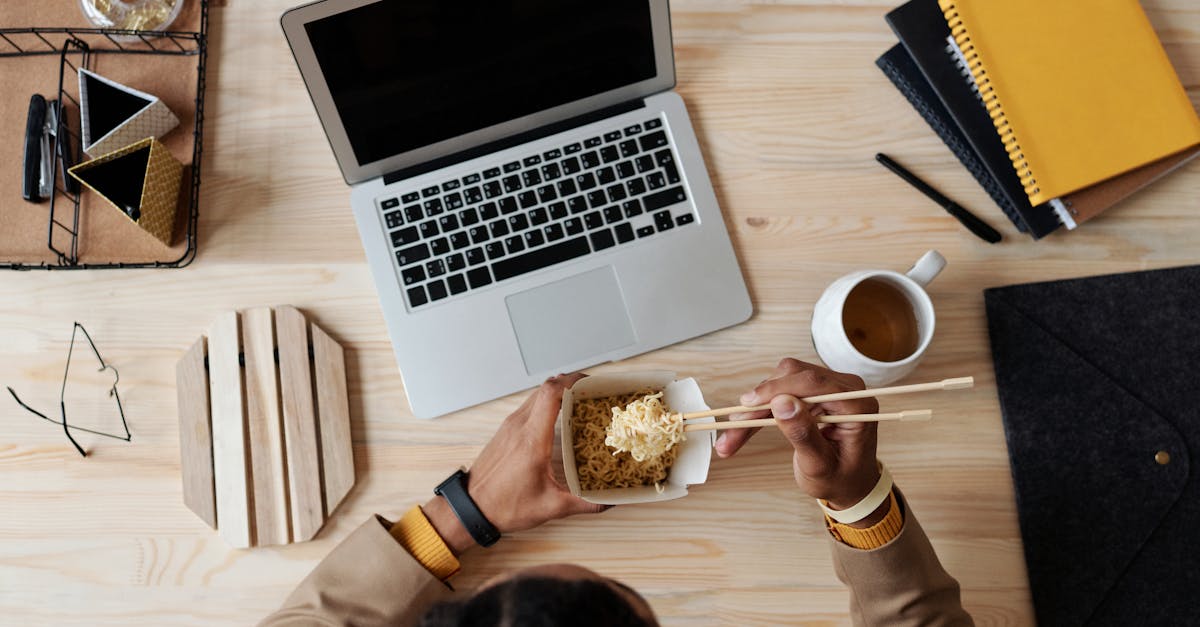 Person Eating Noodles