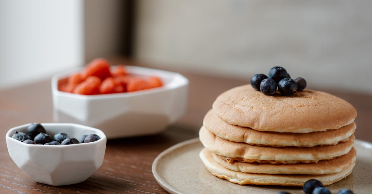 Pancakes With Berries on Ceramic Plate