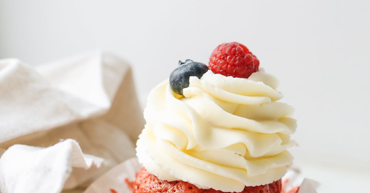  Cupcake With Icing And Berries On Top