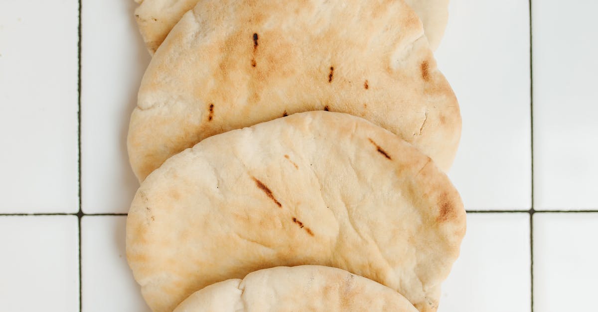 Pita Breads over White Ceramic Tiles