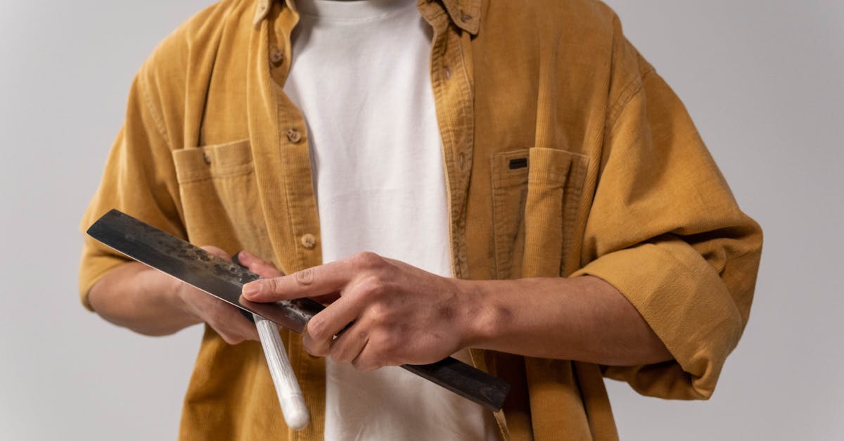 Man Sharpening a Knife