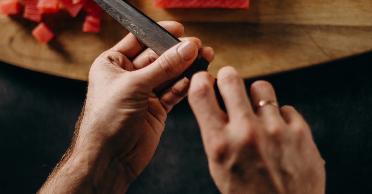 Person Holding Black Tablet Computer