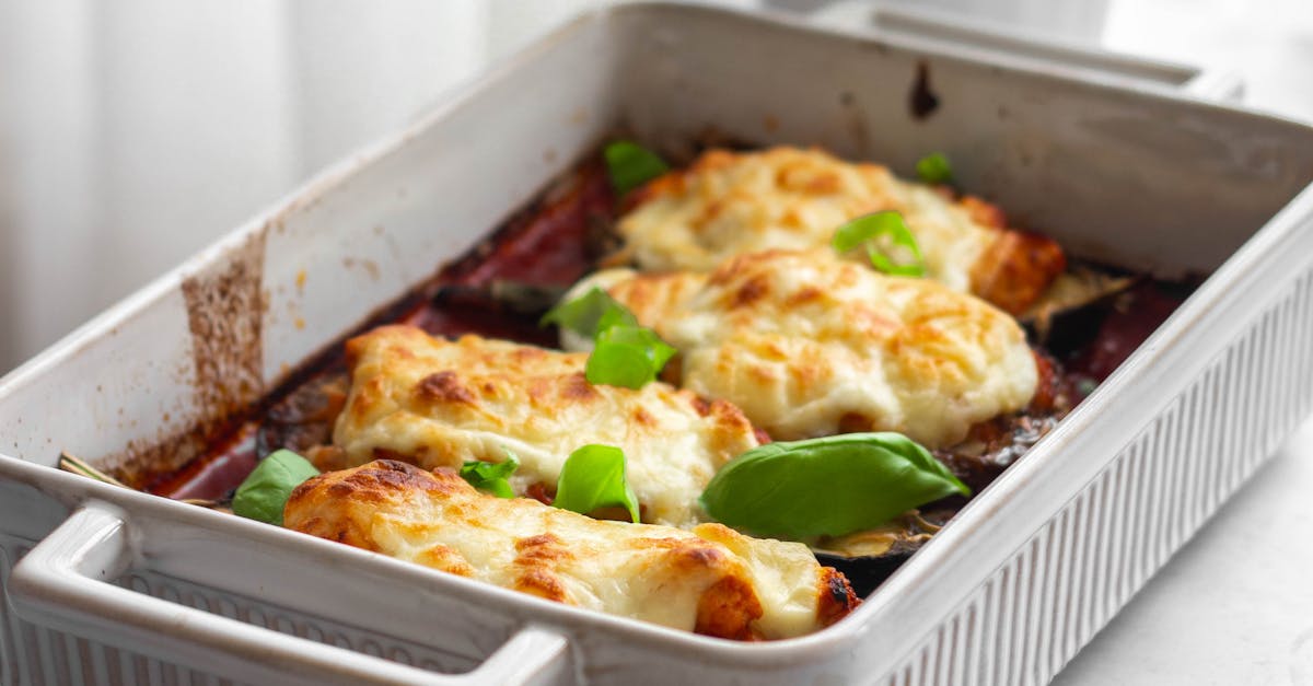 A casserole dish with cheese and vegetables