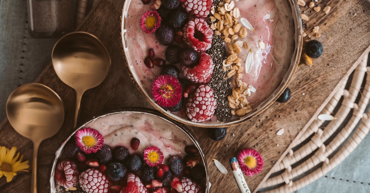 Red and White Round Fruits on Brown Wooden Bowl