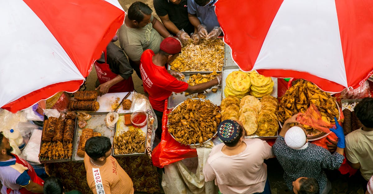 An overhead view of people eating food at a market