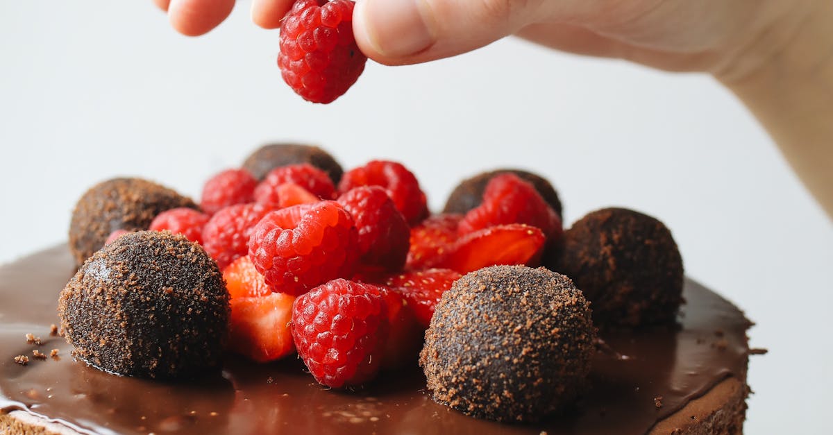 Photo Of Person Holding Raspberry 