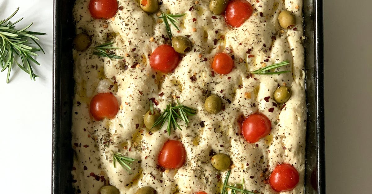 Raw Focaccia with Cherry Tomatoes, Green Olives and Herbs 