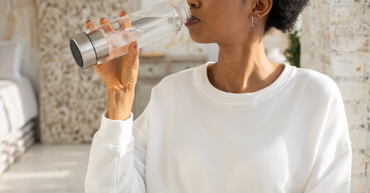 Woman Drinking Water from the Bottle