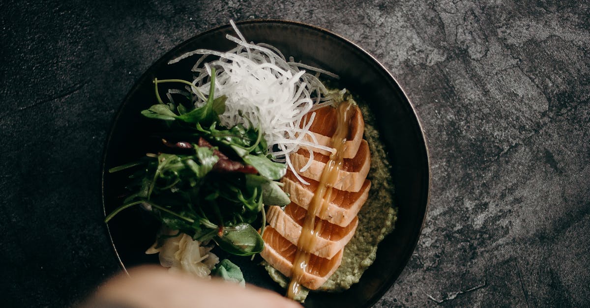 Person Holding a Bowl of Vegetable Salad