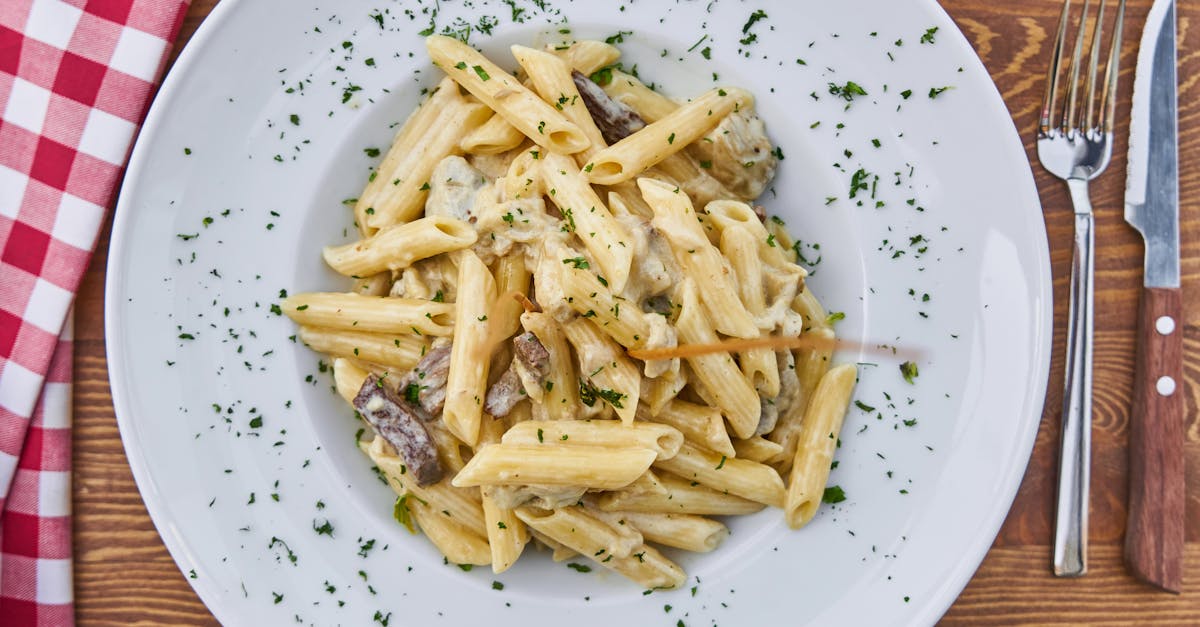 Flat Lay Photography of Pasta Served in White Plate