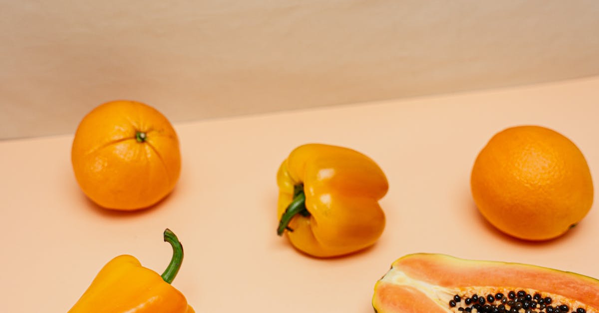 Orange Fruits and Vegetable over Orange Table