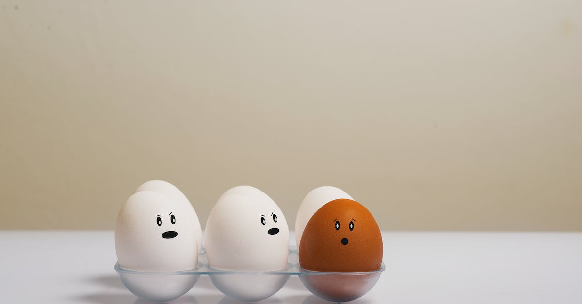 Eggs in Tray on White Surface